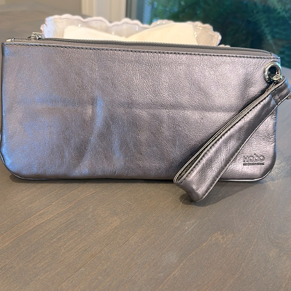 HOBO wrist clutch in Pewter, never used.